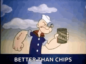 Popeye The Sailor Is Holding A Can Of Spinach In His Hand . GIF
