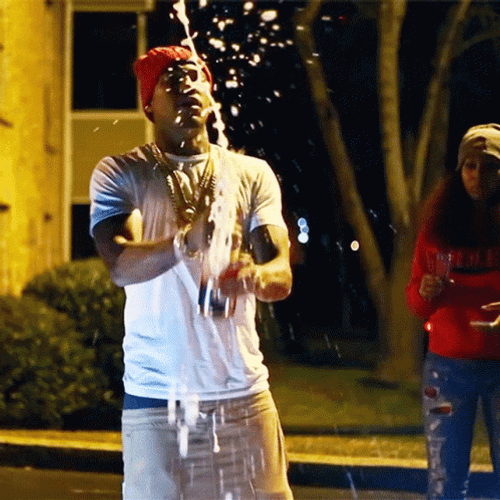 Popping Champagne Bottle On The Street GIF