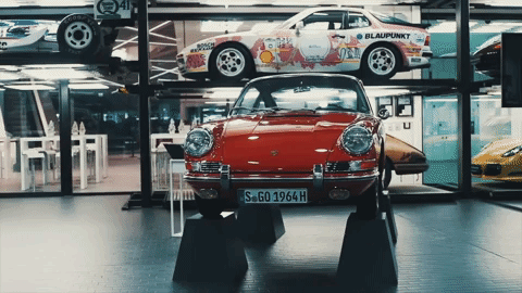 Porsche 911 Classic Red On Display GIF