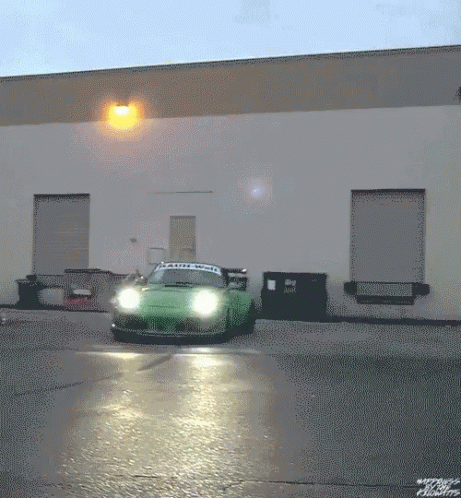 Porsche 911 Green Making A Curve GIF