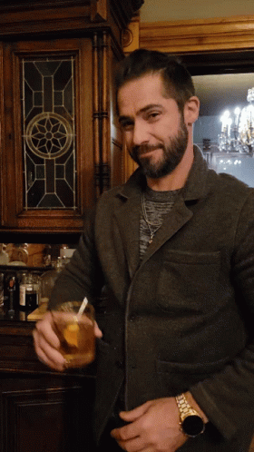 Portrait Handsome Guy Cheers For Whiskey GIF