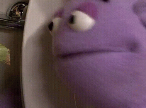 Poseidon's Kiss Elmo Stuck In Toilet Bowl GIF