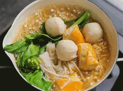 Pot of Soup With Meatballs Noodles and Vegetables