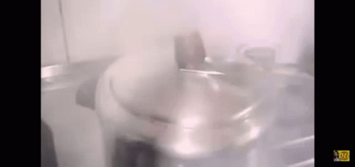 Pot With Steam In Kitchen GIF