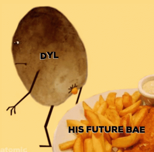 Potato With Arms and Legs Beside French Fries