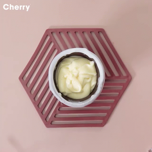 Pouring Blueberries Into Wooden Cup