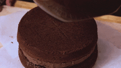 Pouring Delicious Chocolate Ganache Filling GIF
