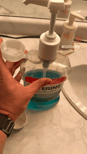 Pouring Glycerine Mouthwash Into Measuring Cup