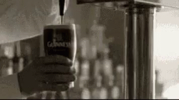 Pouring Guinness Into Glass From Tap GIF