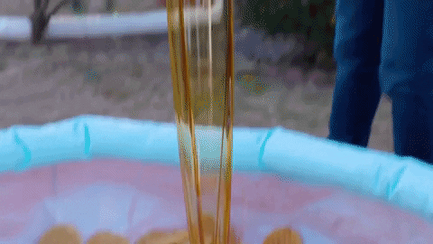Pouring Honey Into Pool Of Waffles GIF