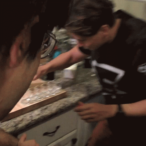 Pouring Hot Sauce In Shot Glass GIF