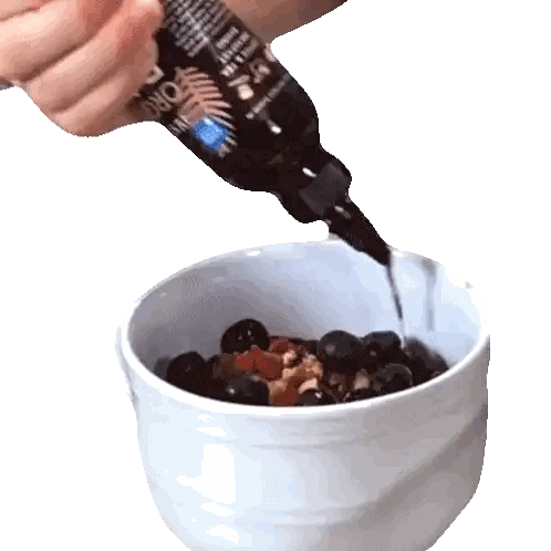 Pouring Liquid Into Berries