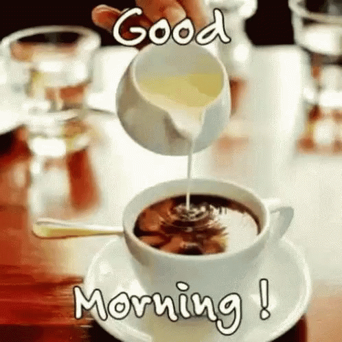 Pouring Milk Into A Cup Of Monday Coffee GIF