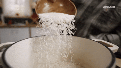 Pouring Raw Rice Into Pot GIF