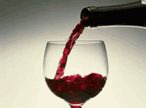 Pouring Red Wine into Glass