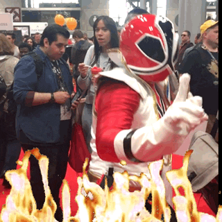 Power Rangers Cosplay In Karate Chop Position GIF
