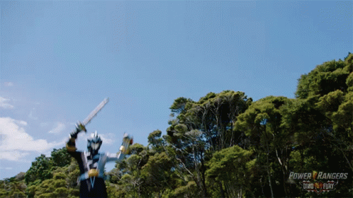Power Rangers Man Holding Sword In Forest GIF