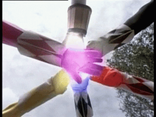 Power Rangers Putting Hands Together in Circle