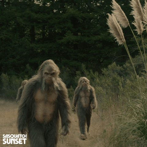 Pre Historic Men Hiking In Wild GIF