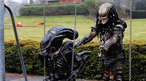 Predator and Alien on Swing Set
