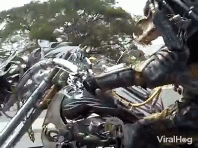 Predator Statue Riding Motorcycle