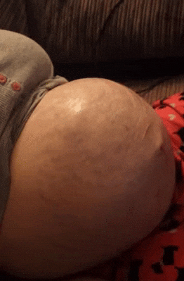 Pregnant Belly Visible Baby Kicks GIF