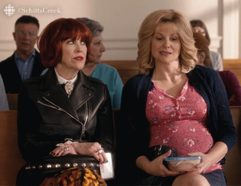 Pregnant Woman Beside Another in Church Schitt's Creek