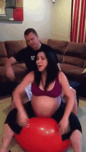Pregnant Woman In Bouncing Ball GIF