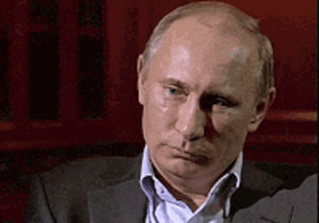 President Vladimir Putin Staring And Laughing GIF
