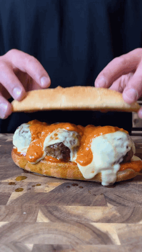 Pressing A Meatball Sub GIF