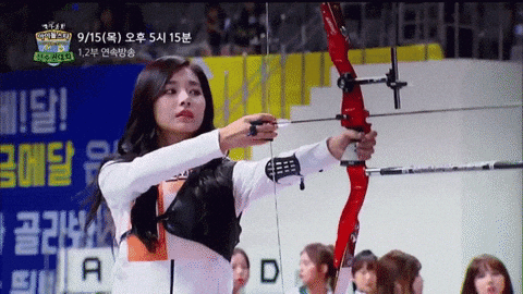 Pretty Asian Participating In Archery Competition GIF