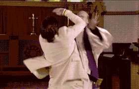 Priest Fighting With Parishioner GIF