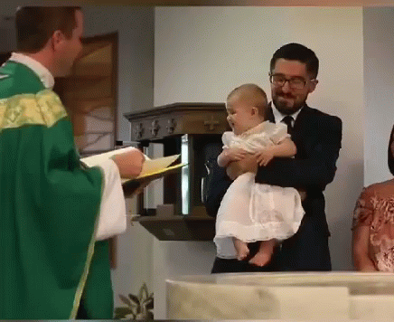 Priest Holding Baby GIF