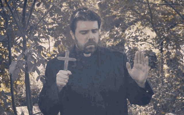 Priest Praying With Cross GIF