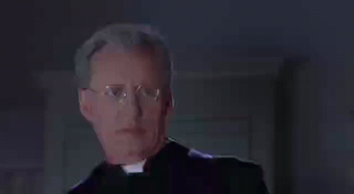 Priest Wearing Glasses and Purple Stole