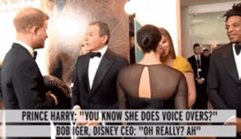 Prince Harry Is Talking To Bob Iger And Disney Ceo At An Event . GIF