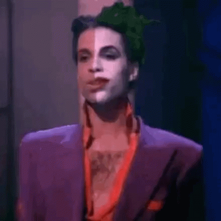 Prince in Purple Suit and Green Hat
