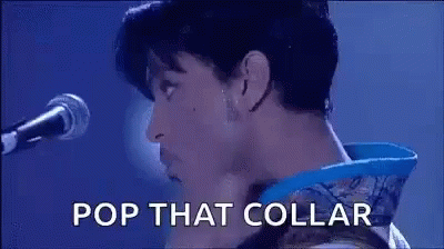 Prince Is Singing Into A Microphone With The Words Pop That Collar . GIF