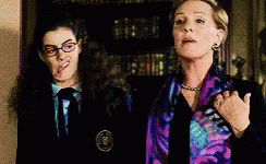 Princess Diaries Mia Pulling Faces Behind Queen Clarisse GIF