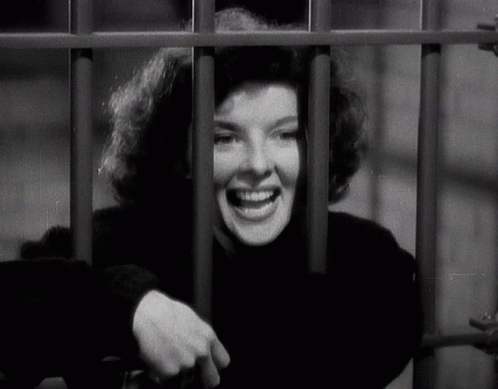 Prison Bars Happy Woman Waving Hand GIF