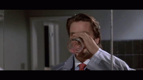 American Psycho Christian Bale Drinking Walking Away GIF