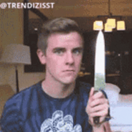 Psycho Guy Licking Knife GIF