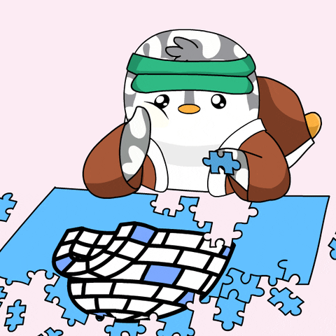 Pudgy Penguin Working On Igloo Puzzle GIF