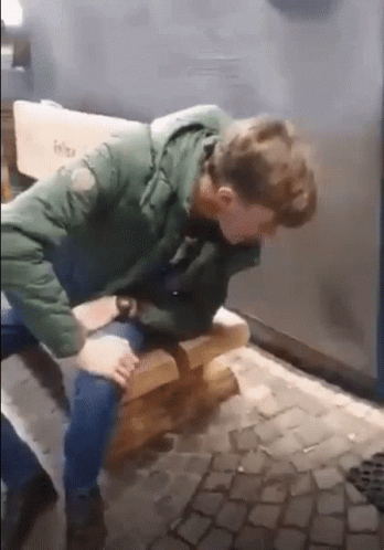 Sitting Boy Puking GIF