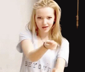Pulling Dove Cameron GIF