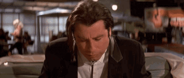 Pulp Fiction Vincent Vega Chewing GIF