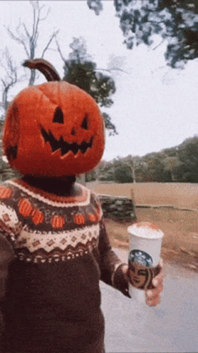 Pumpkin Head Person Holding Starbucks Hot Chocolate