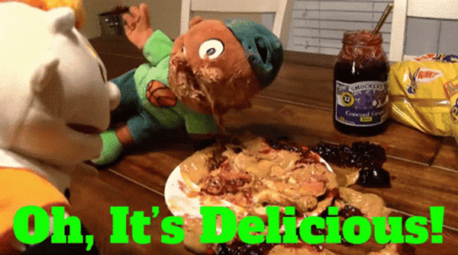Puppet Eating Oh Its Delicious GIF