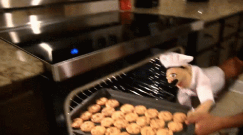 Puppet Hand Cookie Baking At Home GIF