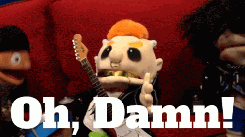 Puppet Holding Guitar Saying Oh Damn